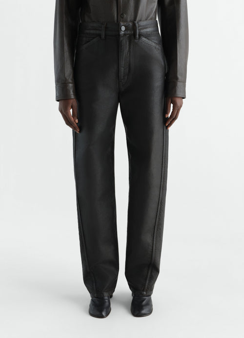 FIVE POCKETS TWISTED PANTS IN COATED DENIM